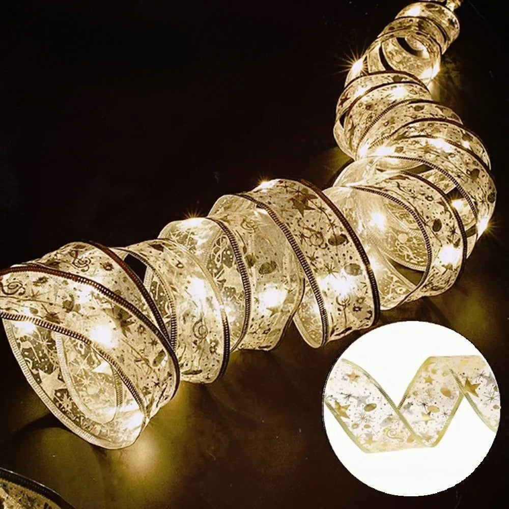 XmasSlinger | Luci e nastri di Natale