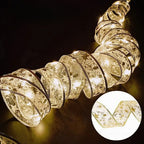 XmasSlinger | Luci e nastri di Natale