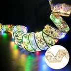XmasSlinger | Luci e nastri di Natale