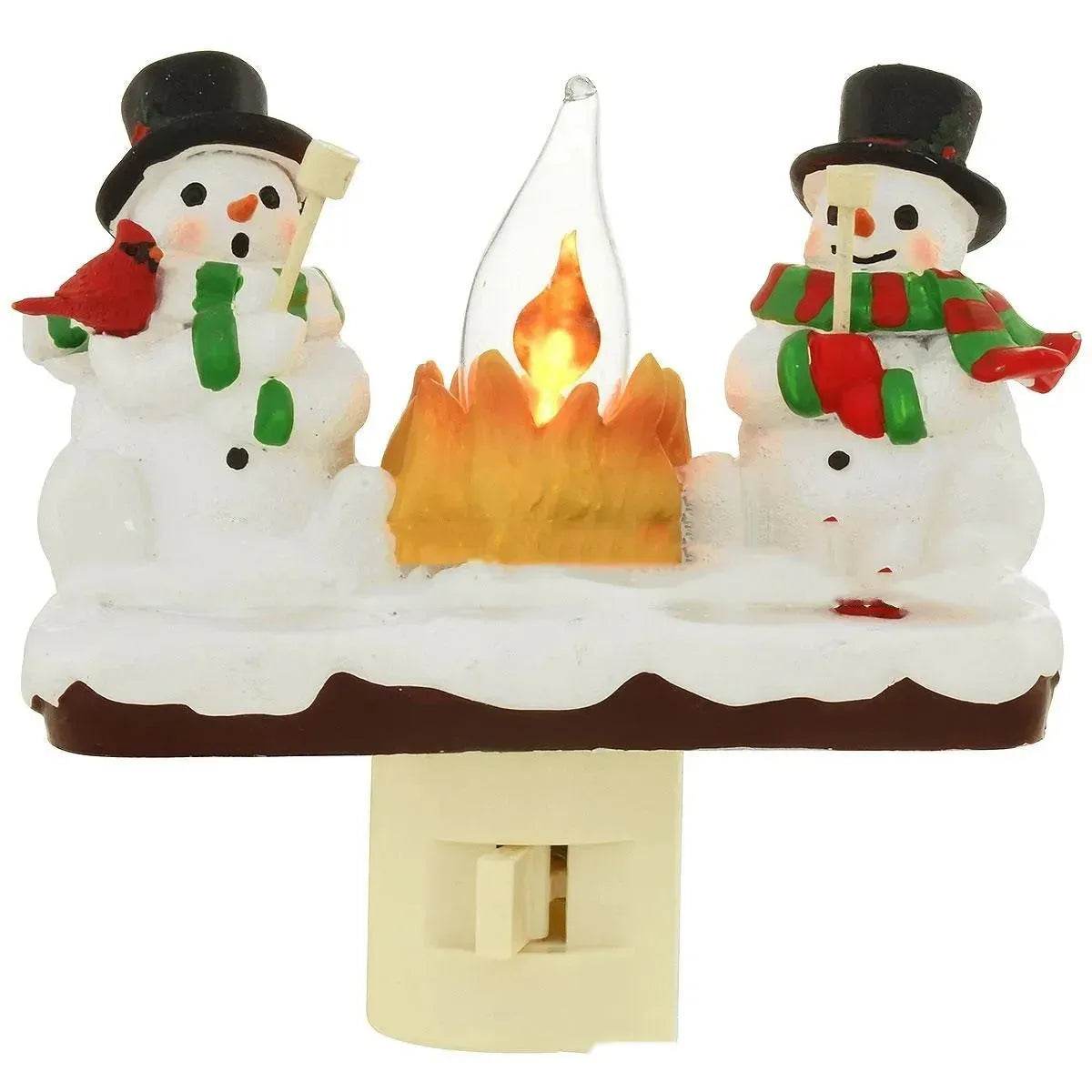 Regalo di Natale con pupazzo di neve e luce notturna per falò per bambini