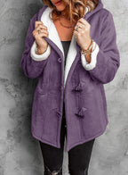 Elegante cappotto con cappuccio con design unico a bottoni