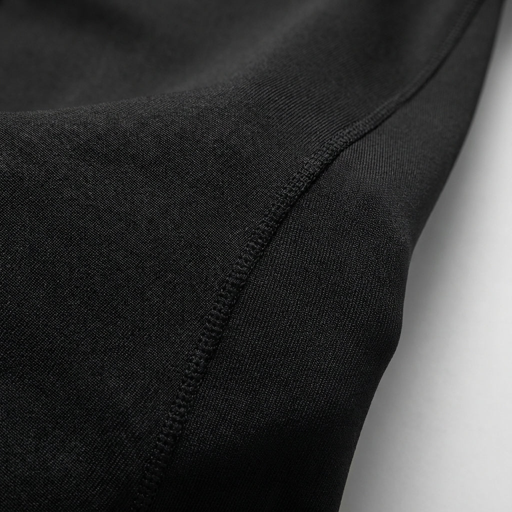 Tuta elegante aderente a maniche lunghe da donna