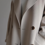 Cappotto lungo doppiopetto elegante da donna