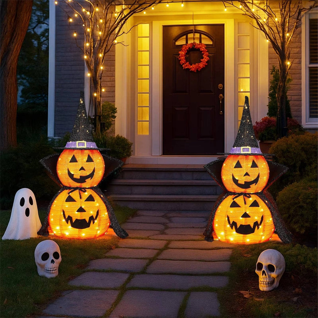 Decorazione di zucca di Halloween illuminata con cappello da strega e mantello per decorazioni natalizie all'aperto e al coperto