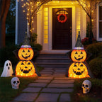 Decorazione di zucca di Halloween illuminata con cappello da strega e mantello per decorazioni natalizie all'aperto e al coperto