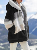 Cappotto imbottito in lana d'agnello a contrasto