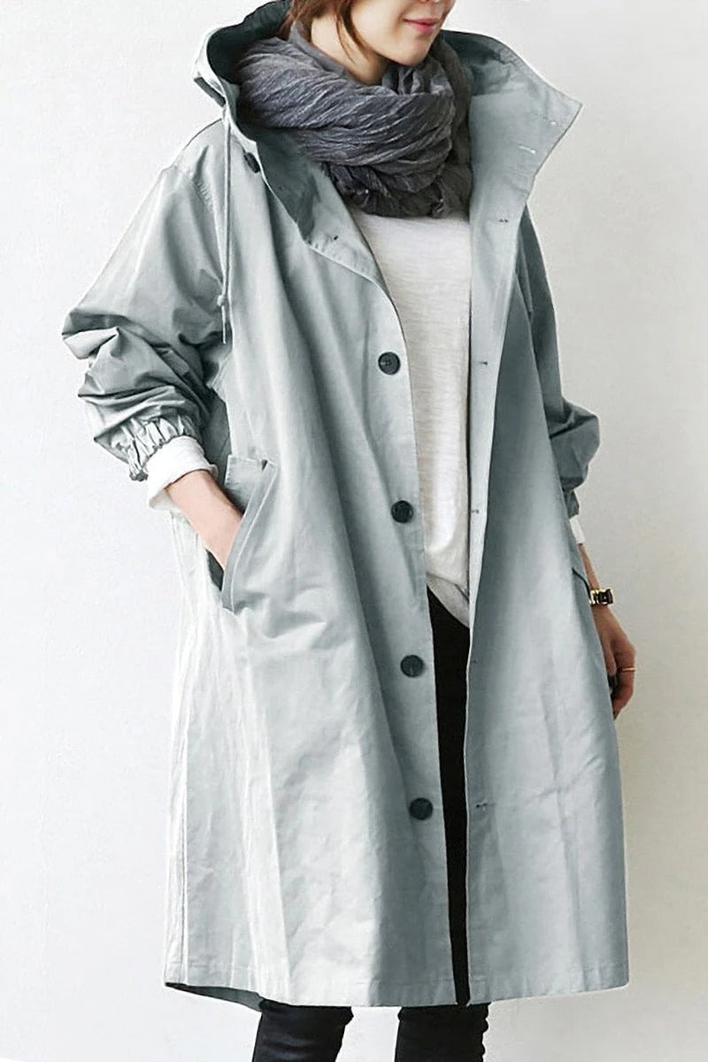 Trench impermeabile con cappuccio