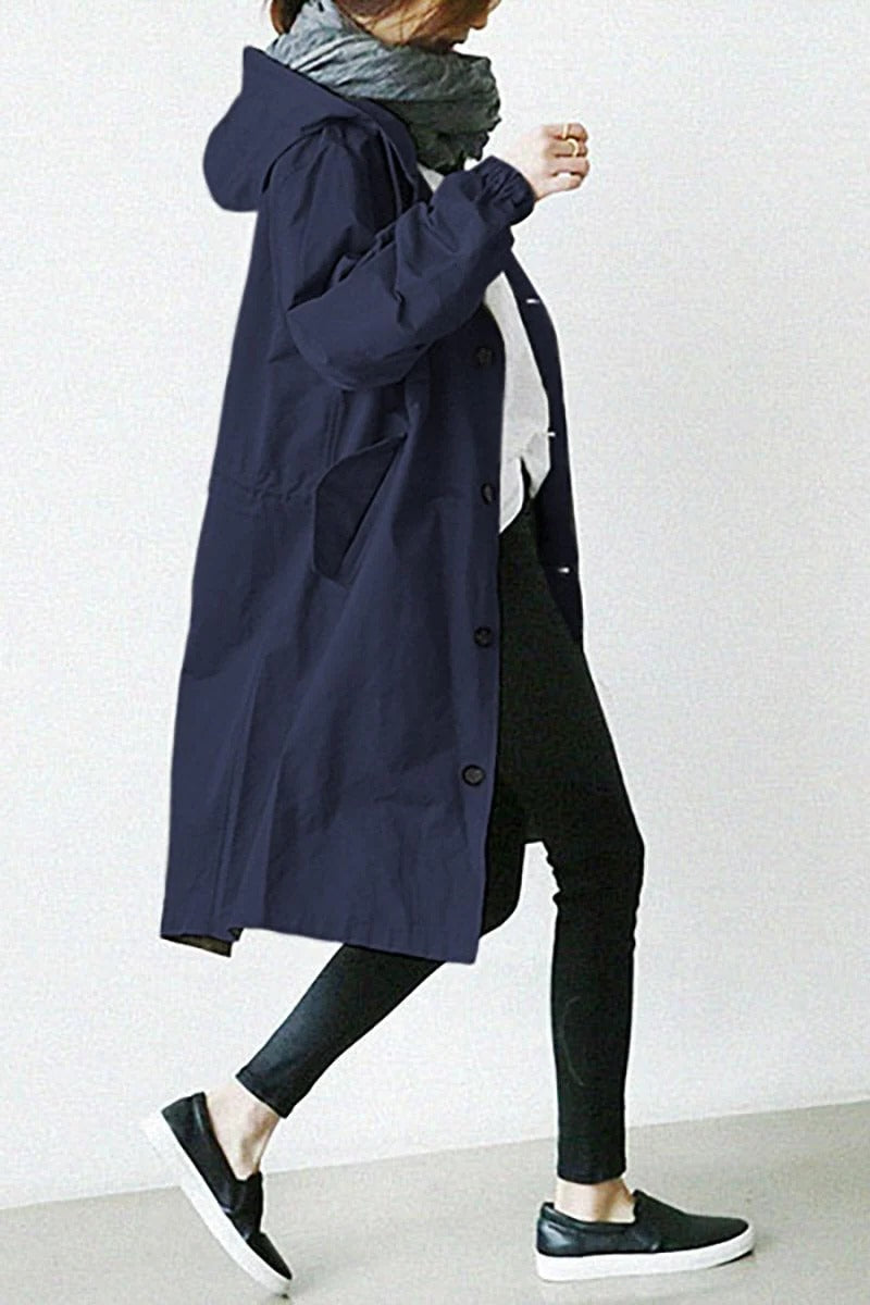 Trench impermeabile con cappuccio