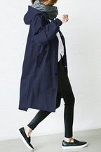 Trench impermeabile con cappuccio