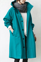 Trench impermeabile con cappuccio