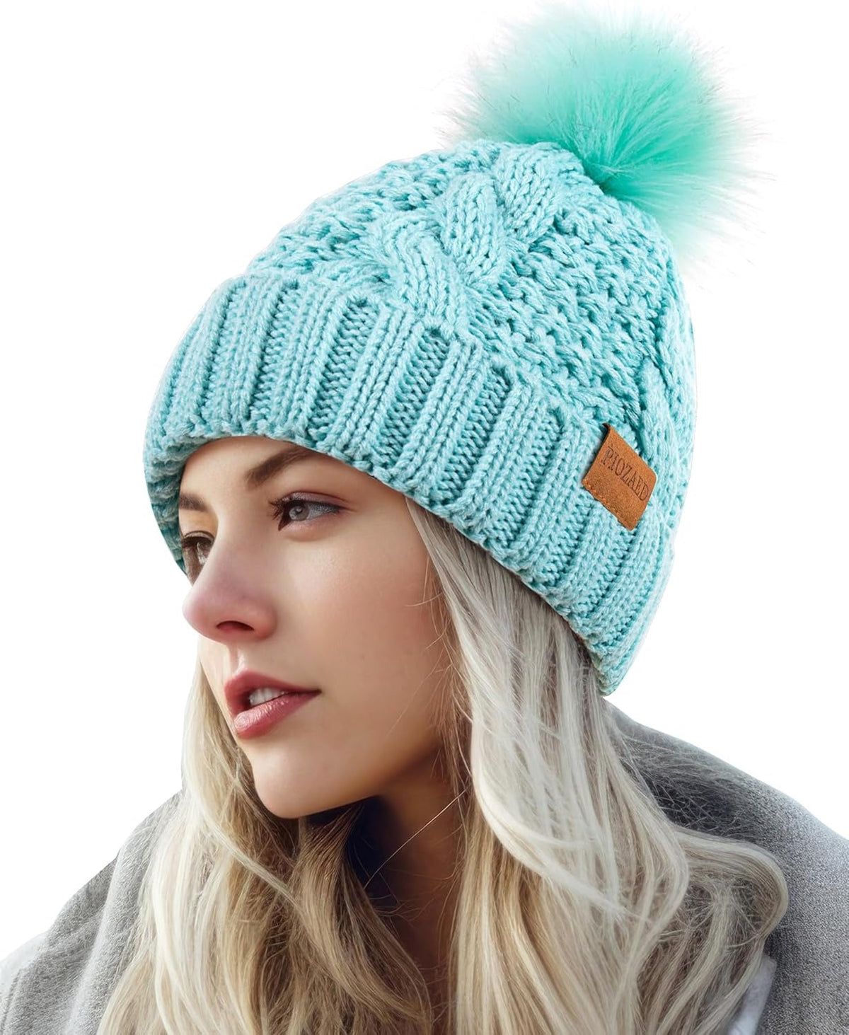 Cappello invernale da donna con pompon e fodera