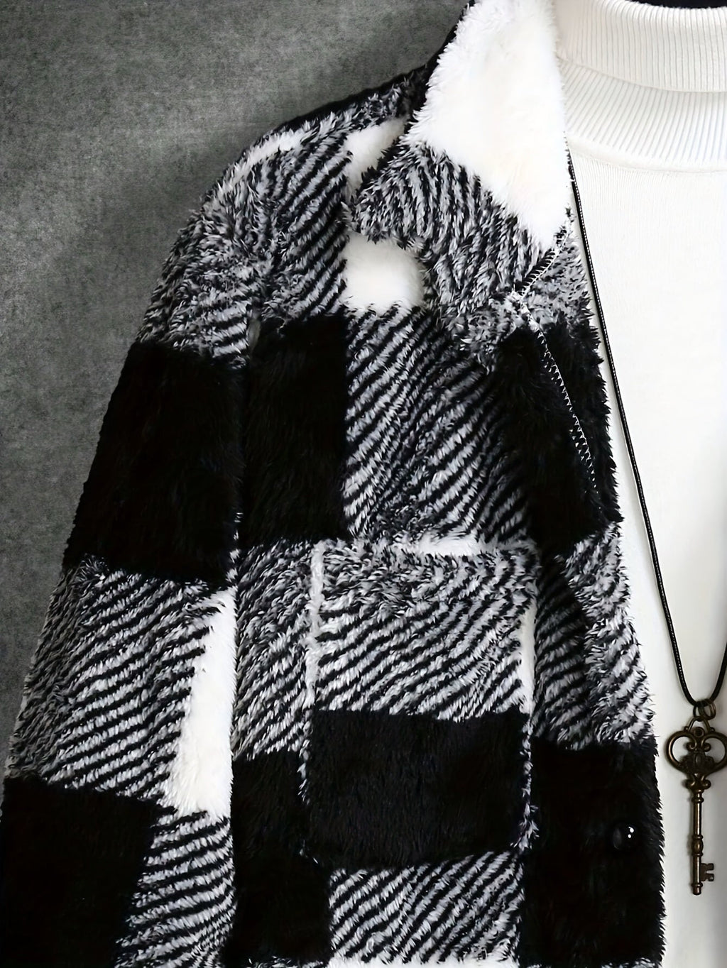 Giacca in pile scozzese da uomo: accogliente stile bianco e nero