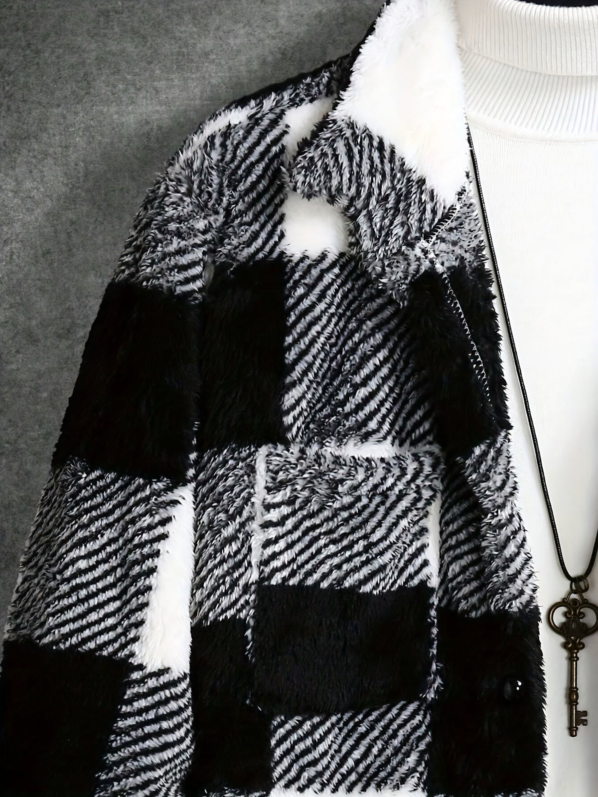 Giacca in pile scozzese da uomo: accogliente stile bianco e nero