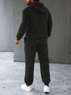 Completo da uomo con cappuccio e pantaloni da jogging in pile accogliente per il massimo calore