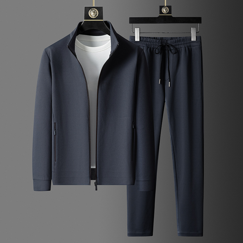 Giacca con zip da uomo e pantaloni da jogging affusolati per un abbigliamento elegante quotidiano