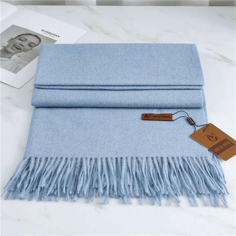 Sciarpa in cashmere con nappe per calore ed eleganza