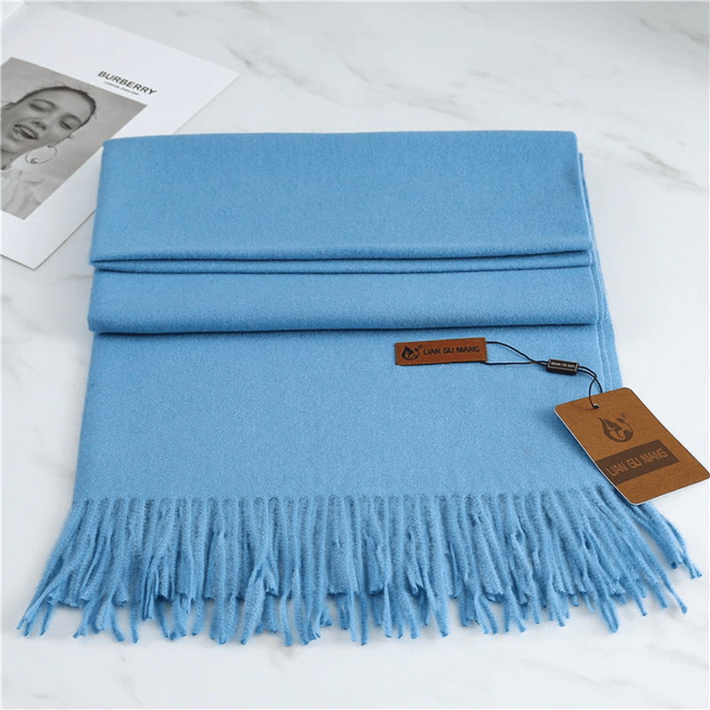 Sciarpa in cashmere con nappe per calore ed eleganza