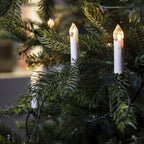 Decorazioni natalizie a lume di candela bianco caldo