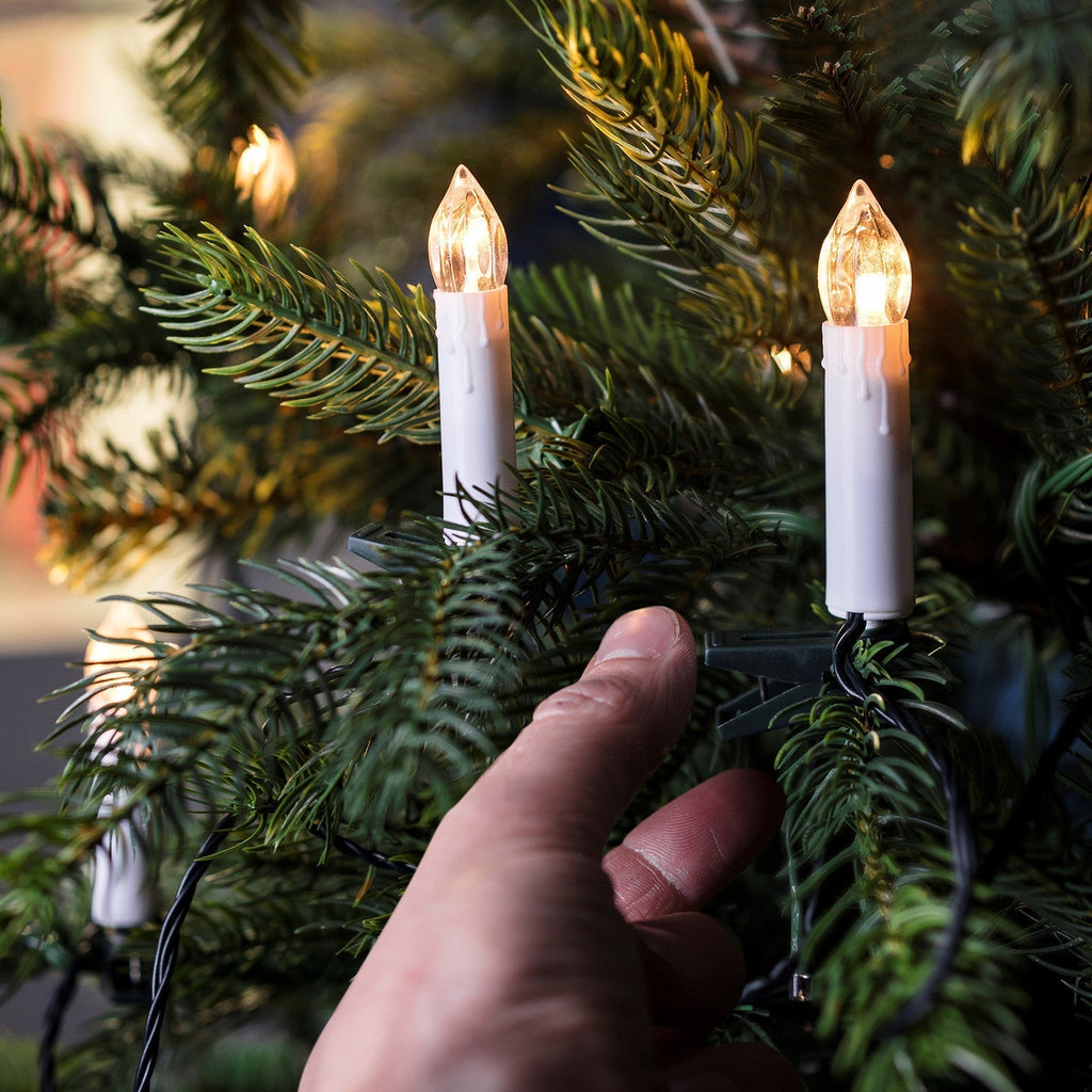 Decorazioni natalizie a lume di candela bianco caldo