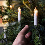 Decorazioni natalizie a lume di candela bianco caldo