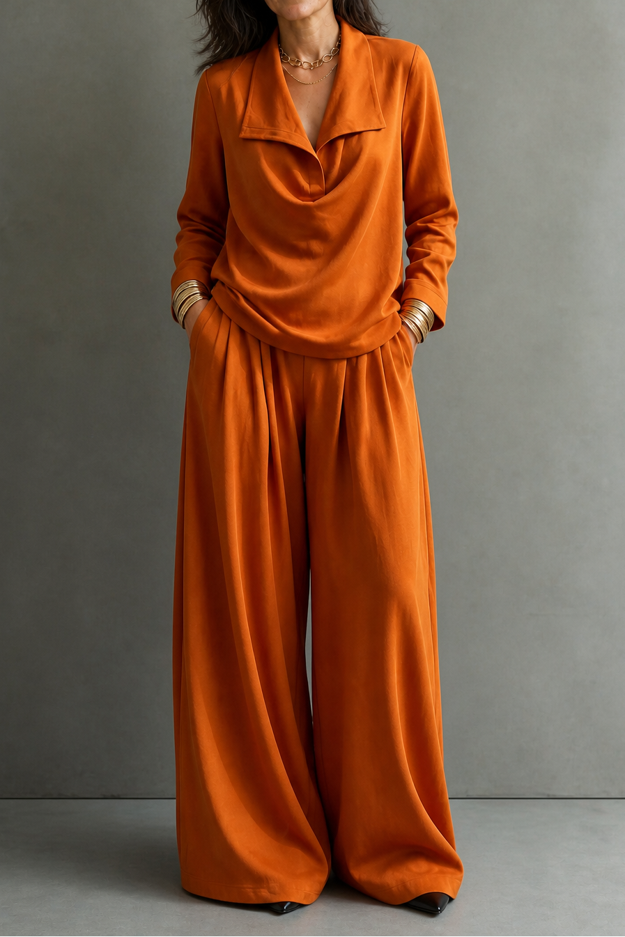 Set con top e pantaloni drappeggiati in maglia a coste