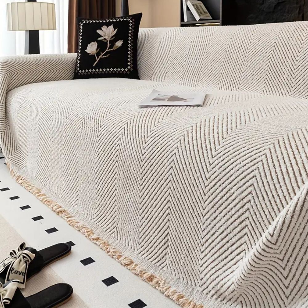 Coperta per divano con motivo a spina di pesce e bordi sfrangiati decorativi
