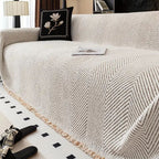 Coperta per divano con motivo a spina di pesce e bordi sfrangiati decorativi