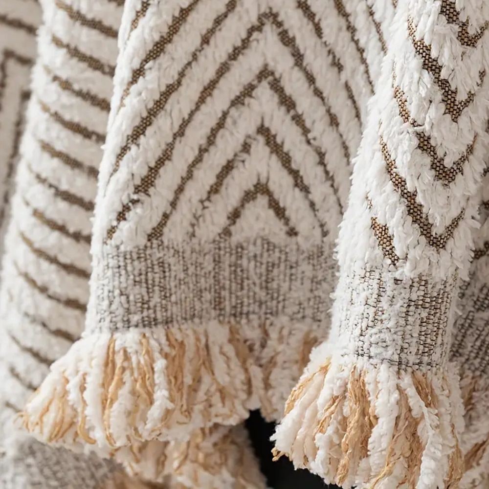 Coperta per divano con motivo a spina di pesce e bordi sfrangiati decorativi