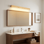 Applique lineare in legno con luce sottile