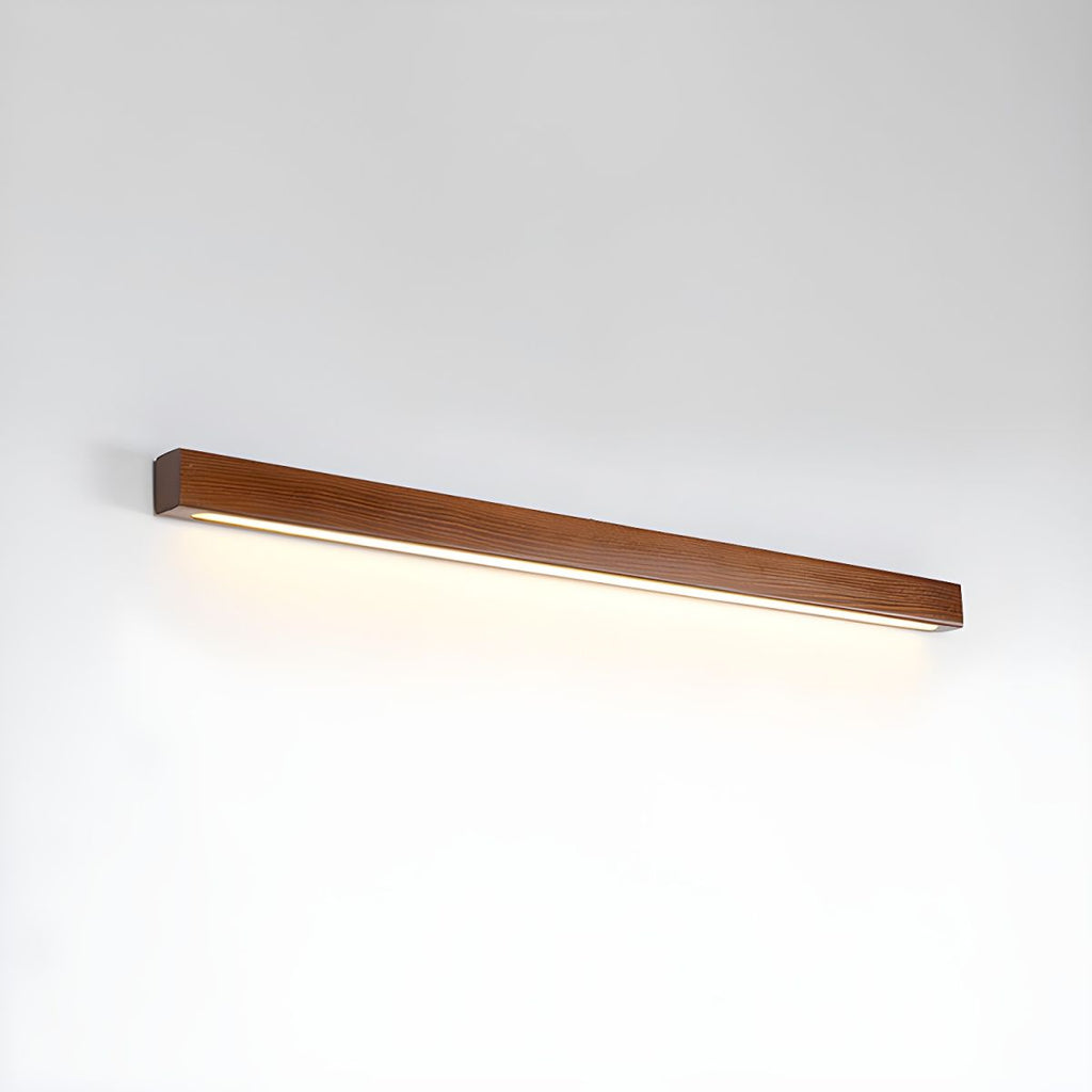 Applique lineare in legno con luce sottile