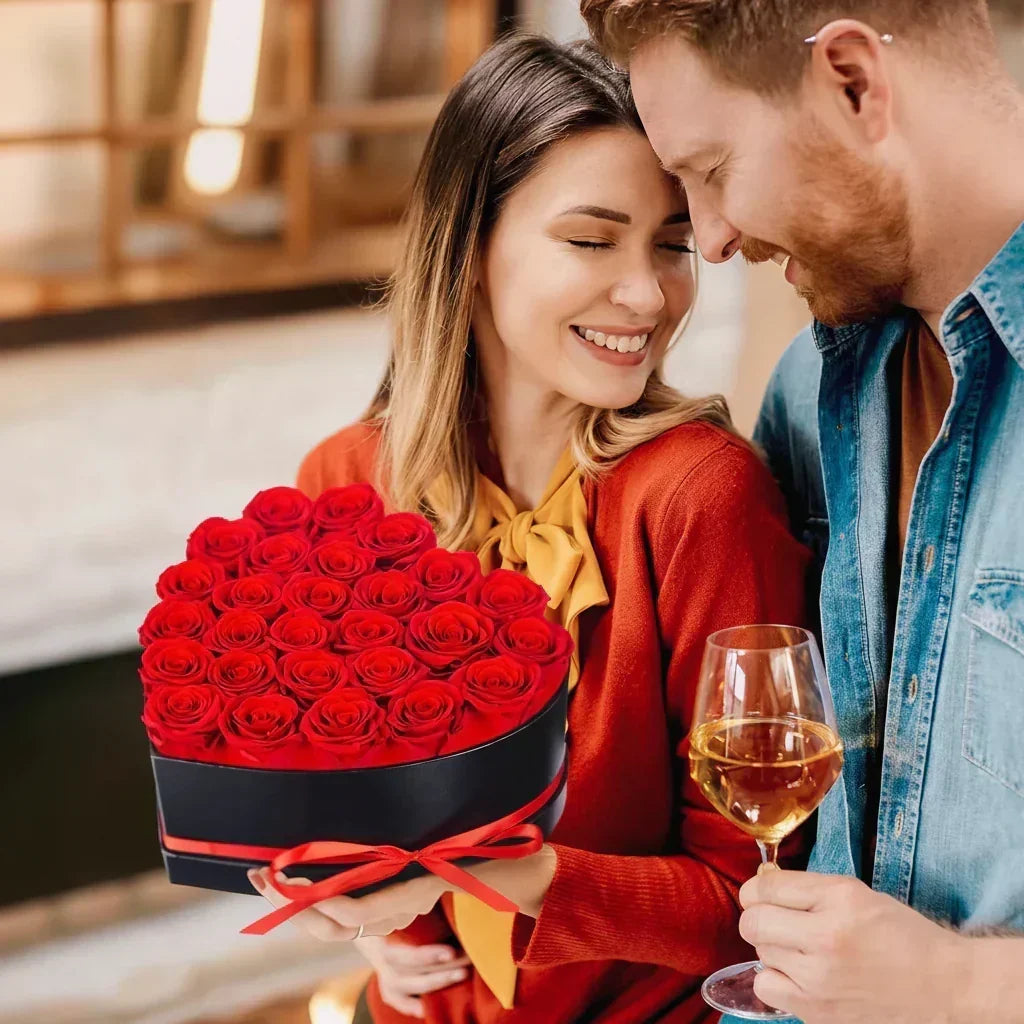 Bouquet di rose artificiali con scatola a forma di cuore