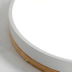 Plafoniera rotonda a filo soffitto con finitura in legno