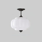 Plafoniera vintage in vetro con dettagli in ottone, elegante lampada a soffitto
