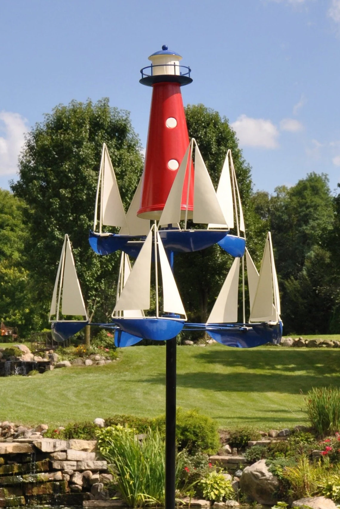 Scultura eolica cinetica con barca e faro | Metallo massiccio
