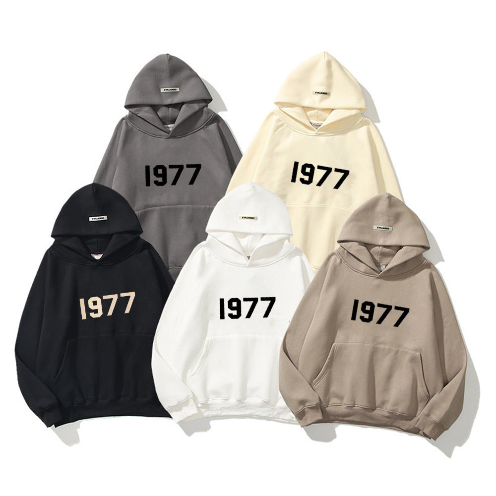 Felpa streetwear unisex con maniche raglan e stampa 1977