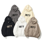 Felpa streetwear unisex con maniche raglan e stampa 1977