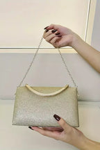 Pochette da sera | Design con manico in velluto nero dorato