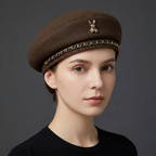 Elegante berretto da donna in misto lana con stemma dell'ape dorata