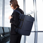 Zaino da viaggio impermeabile espandibile 26–45L con scomparto laptop e modalità borsone